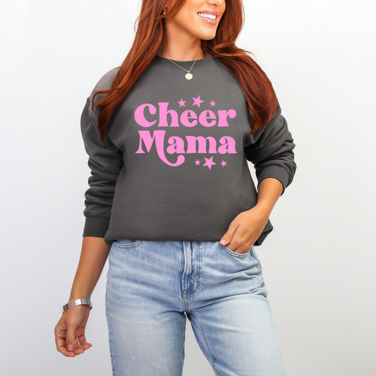 Person wearing a gray sweatshirt with 'Cheer Mama' text in pink on a plain background