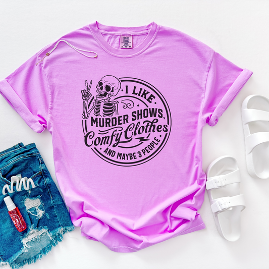 neon purple shirt that says I like murder shows comfy clothes and 3 people shirt