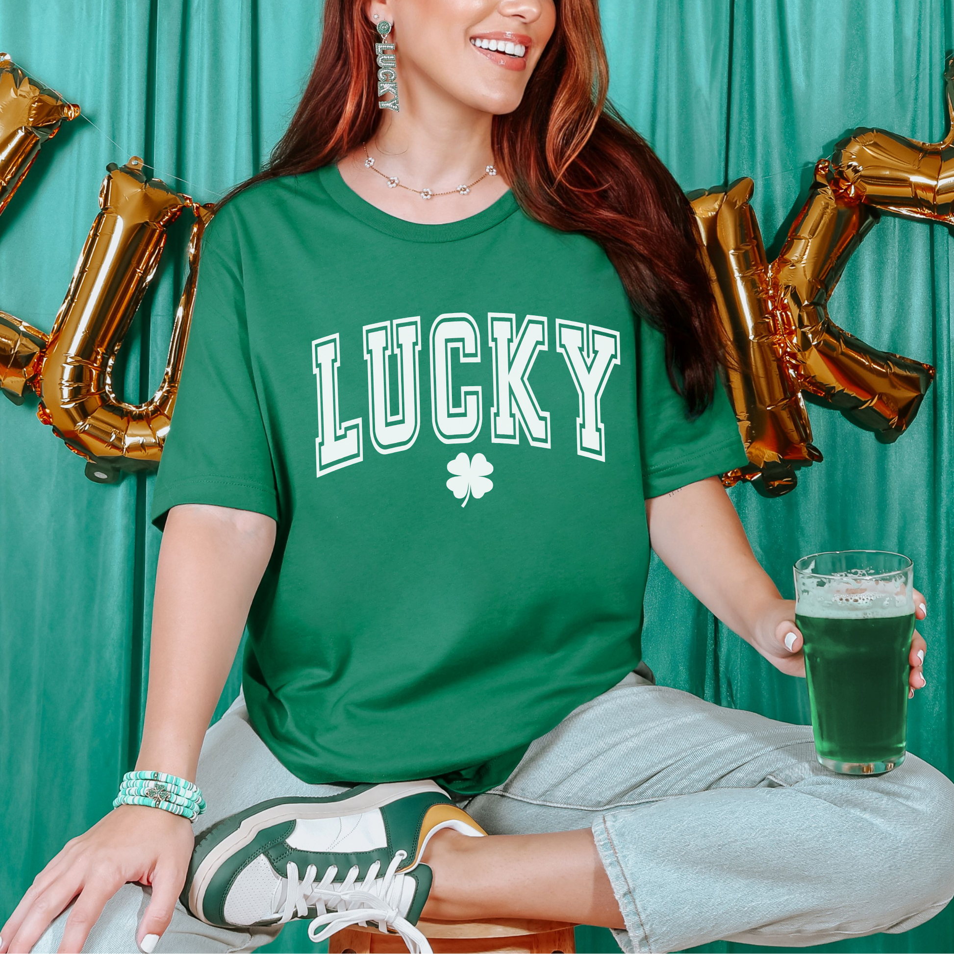 Green shirt with Lucky written in white. St. Patrick's Day shirt for women. 