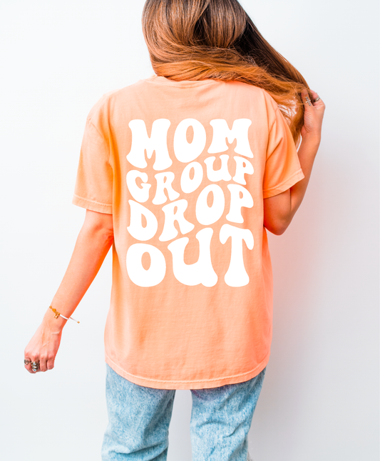 Neon orange shirt that says "Mom Group Dropout" in a white wavy font on the back