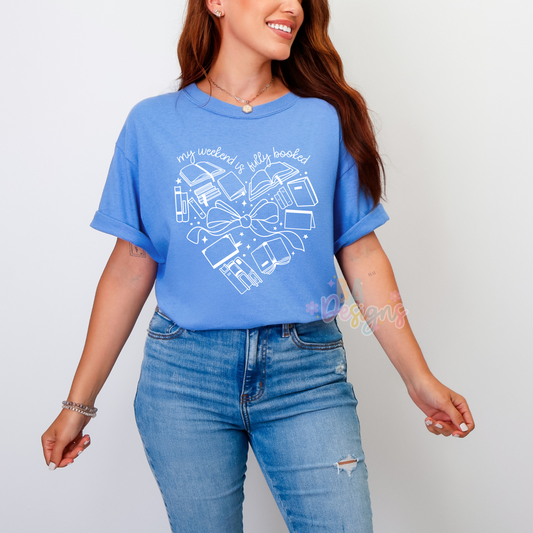 blue shirt that says "my weekend is booked" it has books in the shape of a heart on the front