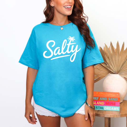 salty written on the front of a bright blue shirt